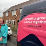 Belinda stood next to a Magna van in Charmouth